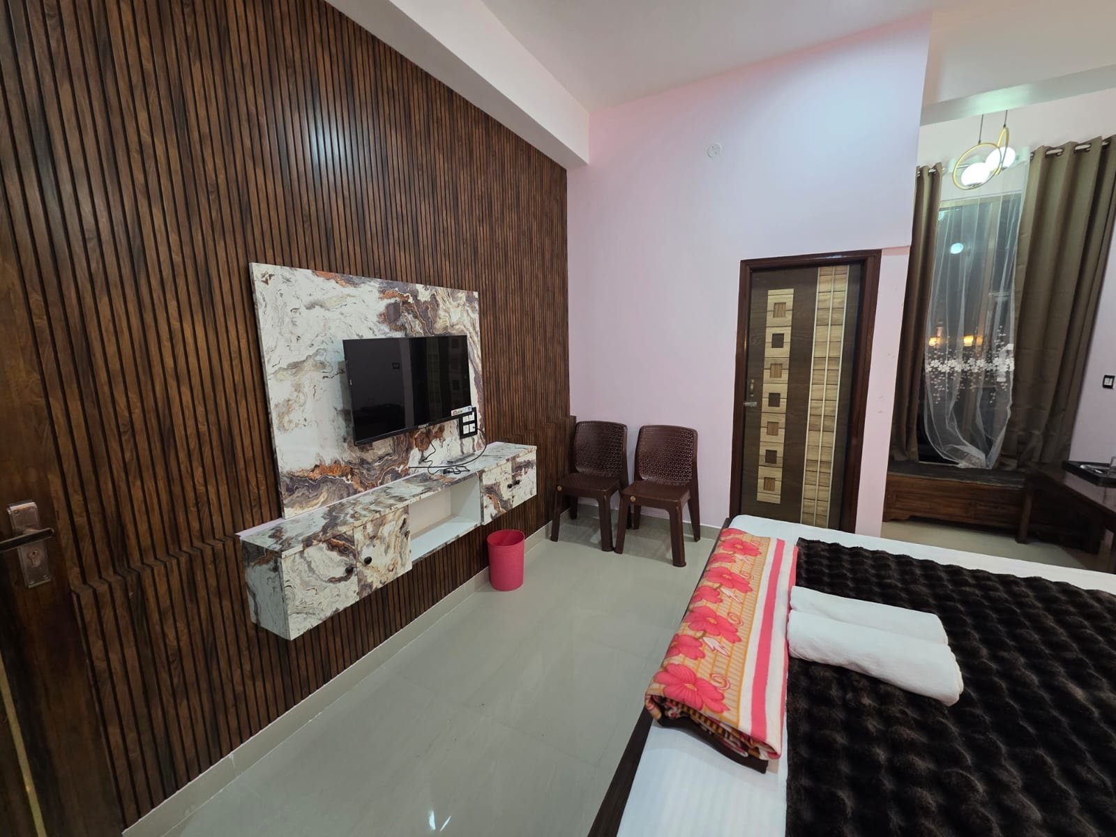 Deluxe Room at Lotus Inn with elegant interior