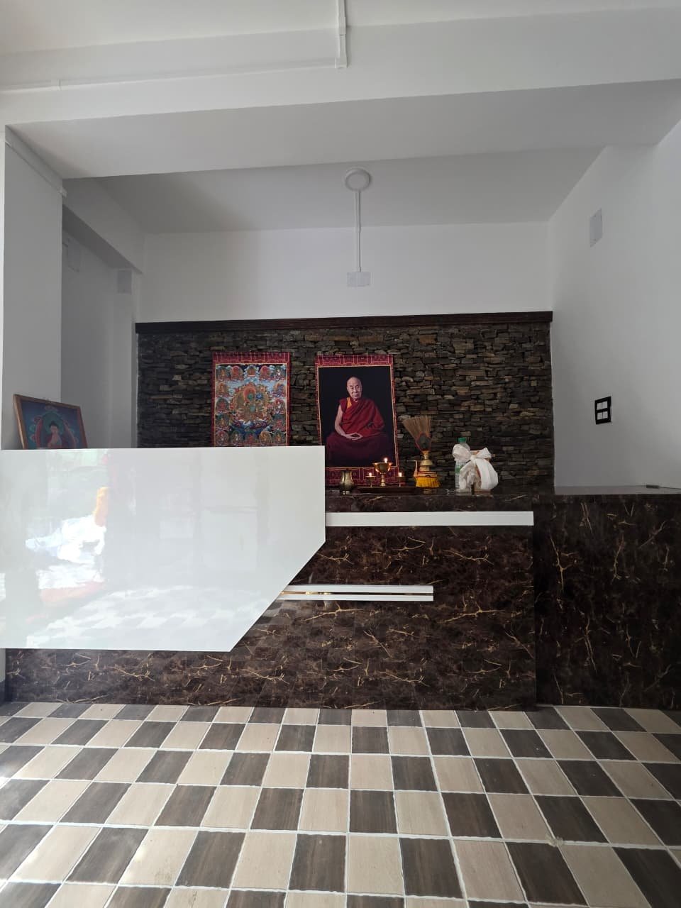 Reception area and support desk at Lotus Inn Jang