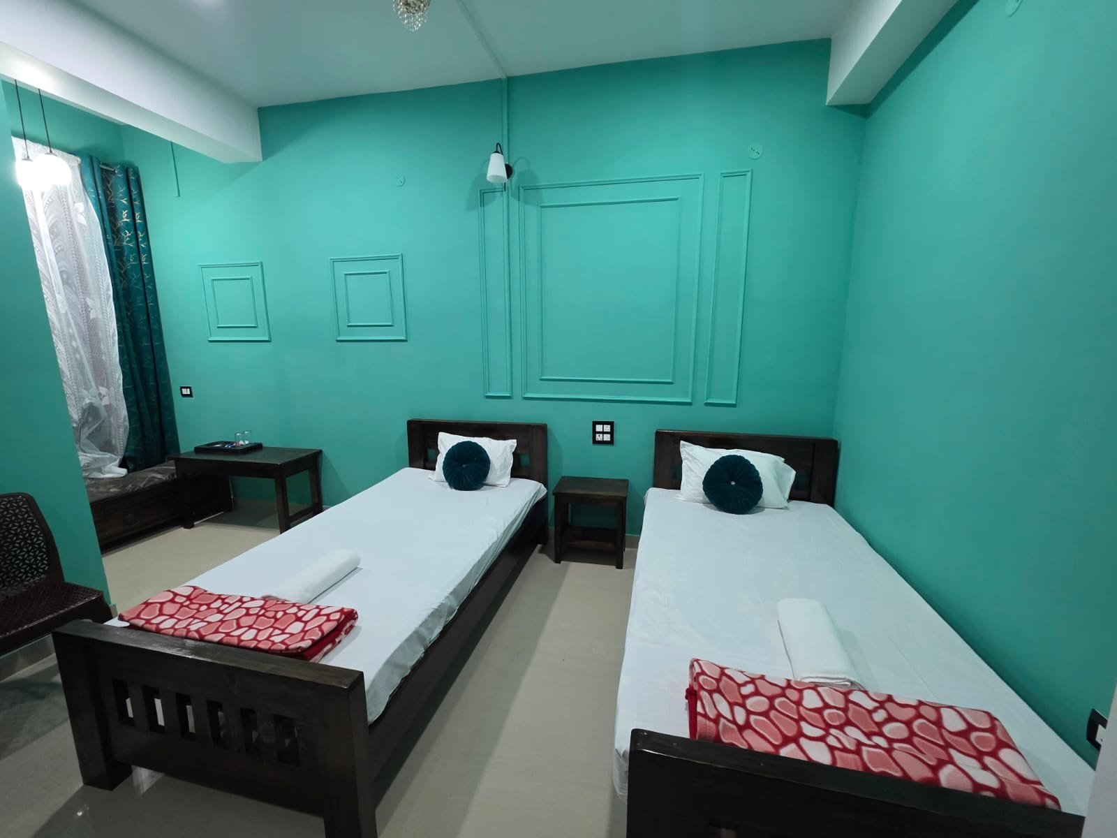 Twin Bed Room at Lotus Inn with separate beds